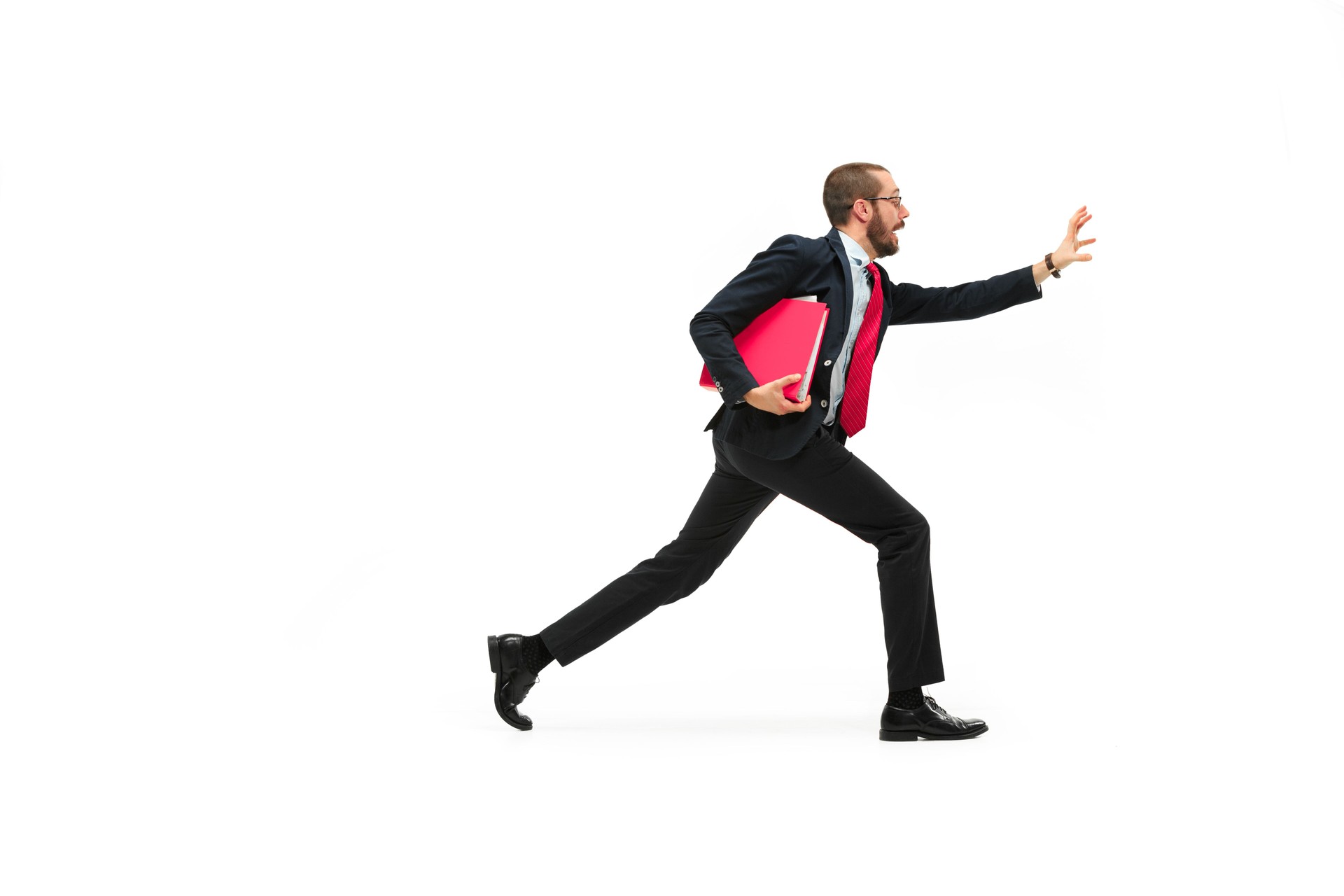 Businessman running with a folder on white background