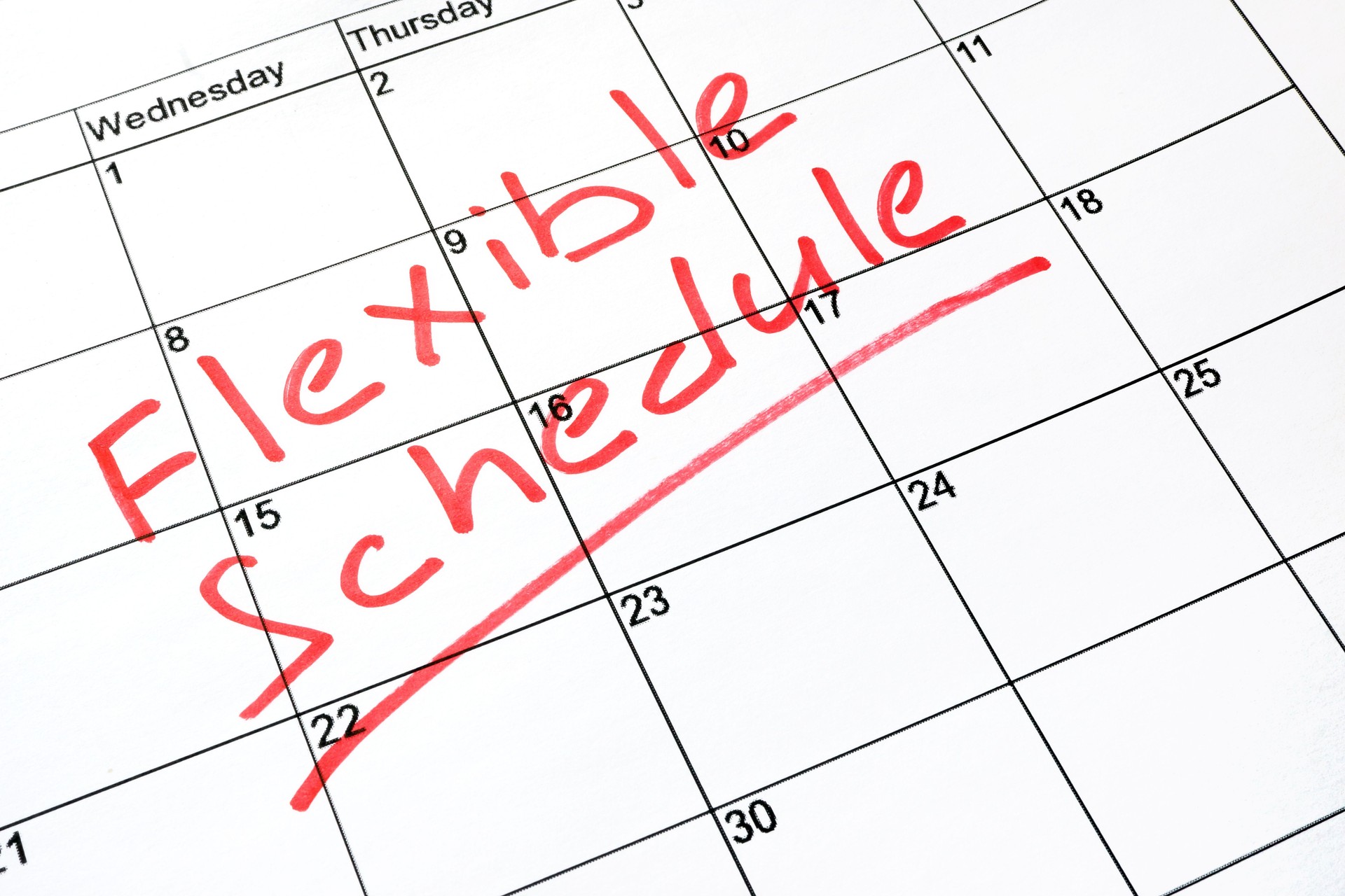 Flexible schedule written on a calendar.